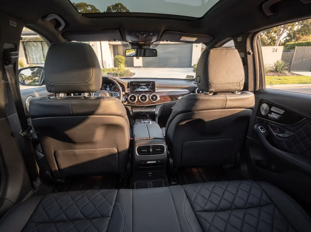 Freshly detailed luxury car cabin in Perth with spotless quilted leather and vacuumed carpet.
